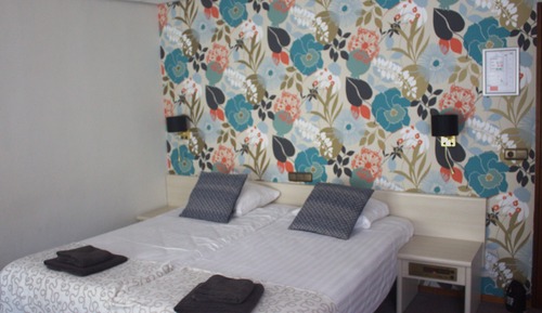 Habitación familiar, varias camas