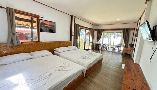Habitación cuádruple familiar, 2 camas de matrimonio, Aire acondicionado, vistas al mar