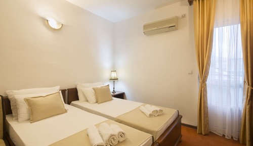 Habitación clásica con 2 camas individuales, vistas a la ciudad