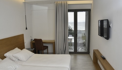 Habitación superior con 1 cama doble o 2 individuales