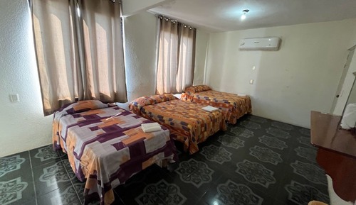 Habitación familiar, varias camas