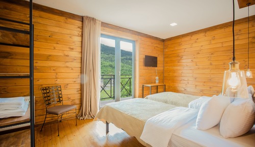 Habitación triple Deluxe, balcón