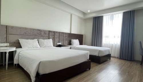 Habitación triple Deluxe