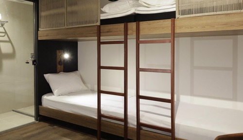 Habitación, varias camas