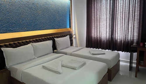 Habitación triple Deluxe