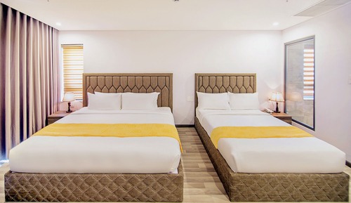 Habitación triple City, varias camas
