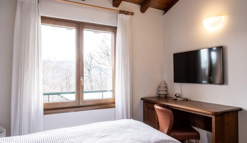 Habitación Confort con 1 cama doble o 2 individuales