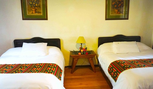 Habitación triple, vistas al jardín