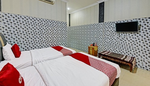 Habitación básica con 2 camas individuales