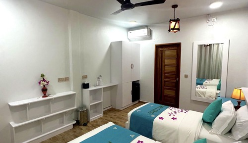 Habitación cuádruple familiar, vistas al jardín