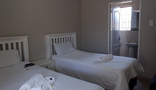 Habitación con 2 camas individuales