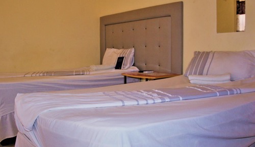 Habitación estándar con 1 cama doble o 2 individuales