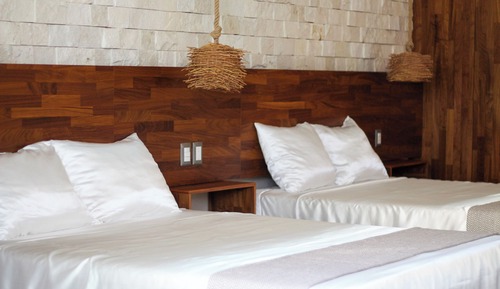 Habitación junior con 1 cama doble o 2 individuales