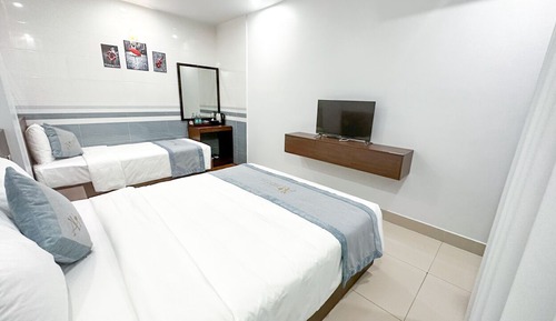 Habitación triple estándar, varias camas