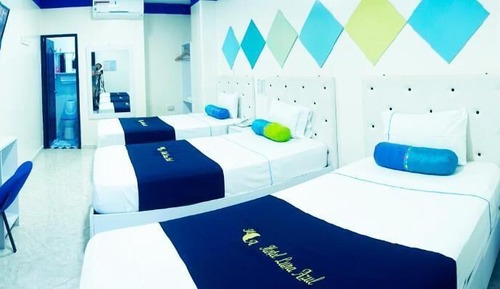 Habitación triple superior, varias camas