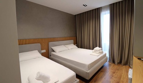 Habitación triple Deluxe