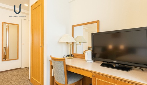 Habitación básica con 2 camas individuales