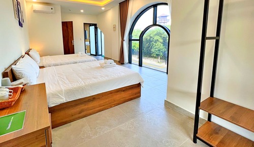 Habitación cuádruple Deluxe