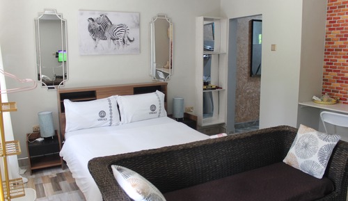 Suite estudio ejecutiva, 1 cama de matrimonio, en la zona del jardín