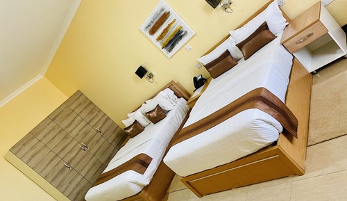 Habitación Business con 1 cama doble o 2 individuales