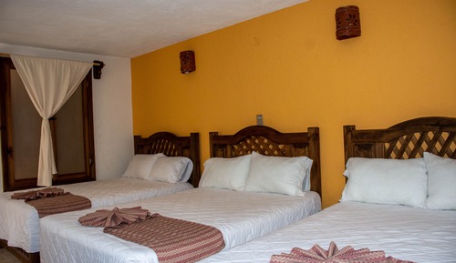 Habitación triple familiar, varias camas