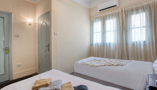 Habitación estándar con 1 cama doble o 2 individuales, vistas al jardín