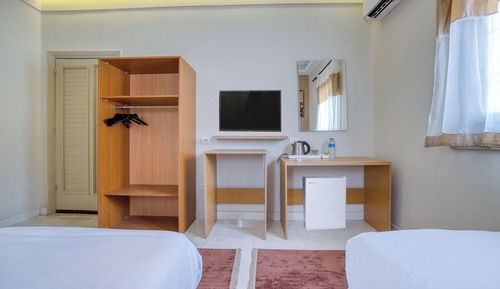 Habitación estándar con 1 cama doble o 2 individuales