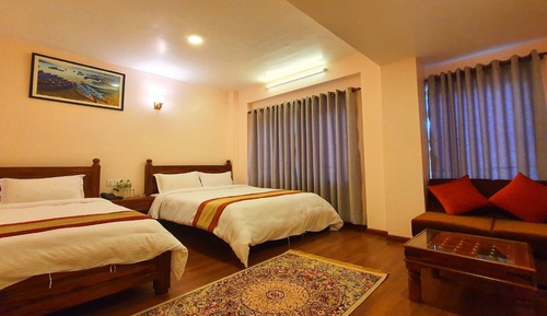 Habitación triple Deluxe