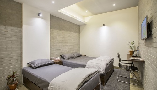 Habitación familiar con 2 camas individuales