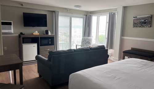 Suite panorámica, 1 cama de matrimonio grande con sofá cama, balcón, vistas al puerto