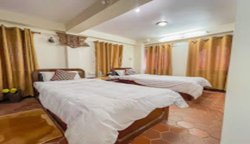 Habitación con 2 camas individuales