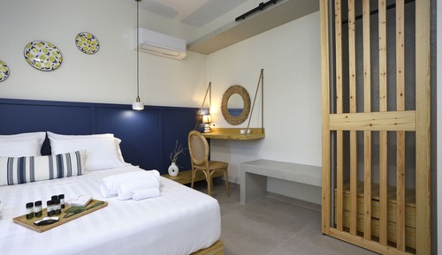 Habitación cuádruple Deluxe, 1 cama de matrimonio con sofá cama
