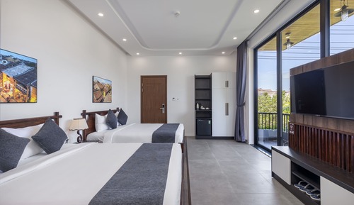 Habitación cuádruple Deluxe, 2 camas de matrimonio (304)