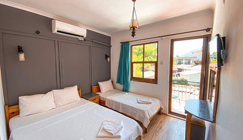 Habitación triple estándar, vistas al jardín