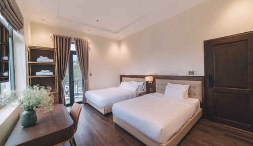 Habitación Deluxe doble, varias camas