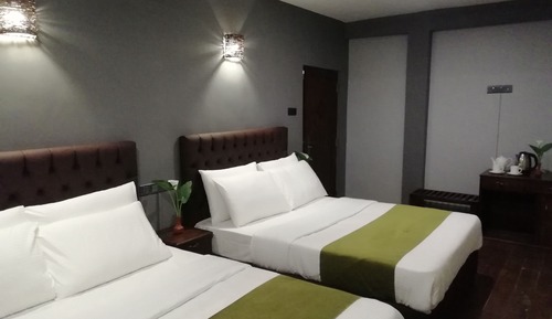 Habitación cuádruple Deluxe, 2 camas de matrimonio, no fumadores, vistas a la montaña