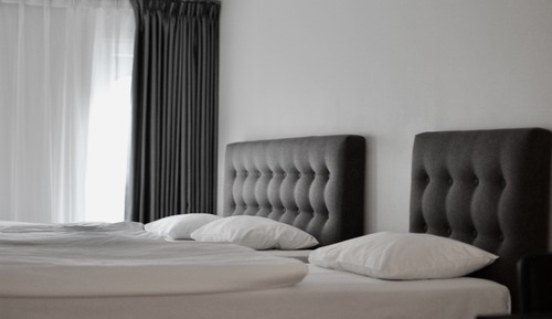 Habitación triple, varias camas