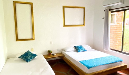 Habitación triple estándar, vistas al jardín
