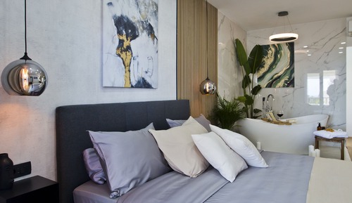 Habitación de lujo, bañera de hidromasaje, vistas parciales al mar