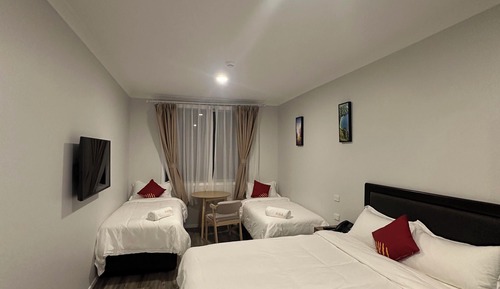 Habitación triple Deluxe