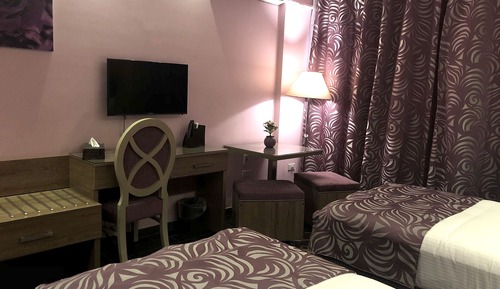 Habitación Elite con 2 camas individuales