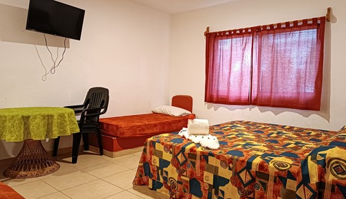 Habitación familiar, varias camas, cocina básica