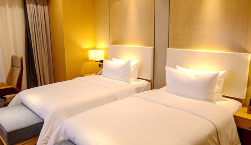 Habitación básica con 2 camas individuales