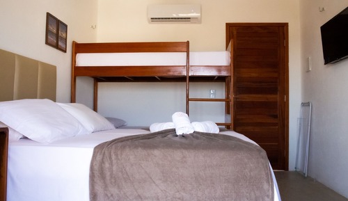Habitación cuádruple Confort, varias camas