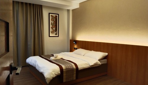 Habitación Deluxe, 1 cama de matrimonio, no fumadores, acceso a la piscina