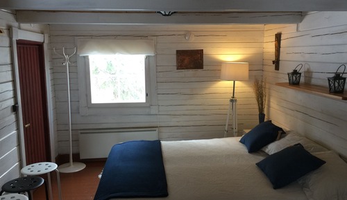 Casa económica en un árbol