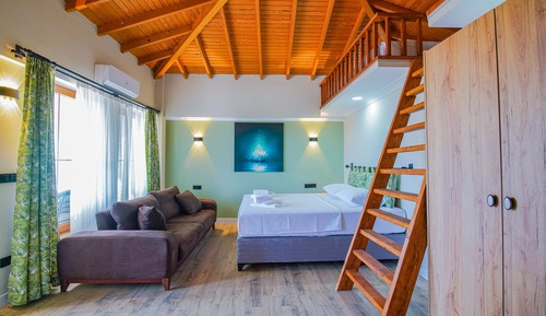 Habitación cuádruple Deluxe