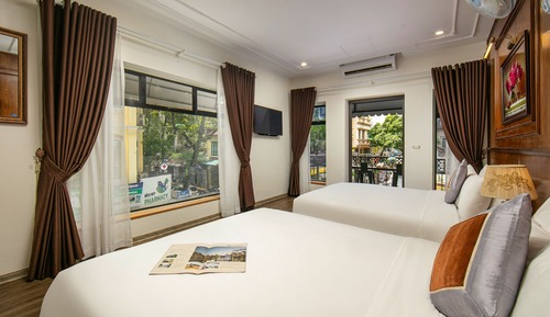 Habitación cuádruple familiar, 2 camas de matrimonio, balcón, vistas a la ciudad