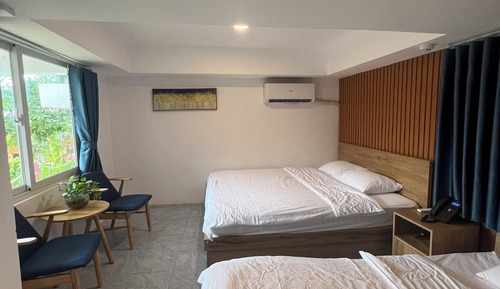 Habitación triple estándar, vistas al jardín