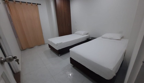Habitación Business con 1 cama doble o 2 individuales